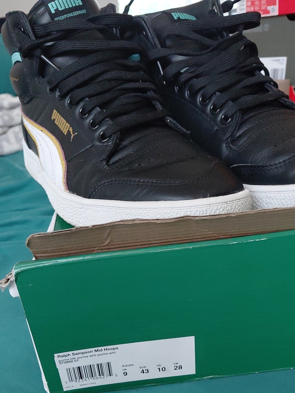 Puma Black/White Mid-Top Sneakers with Gold Accent